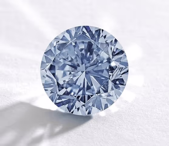 Blue diamond on white backdrop.