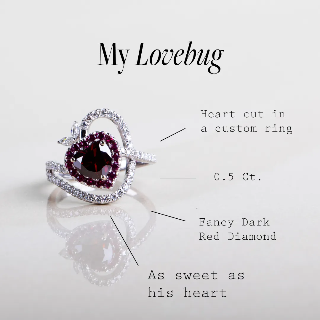 Fancy dark red heart-shaped diamond ring made from pet's ashes.
