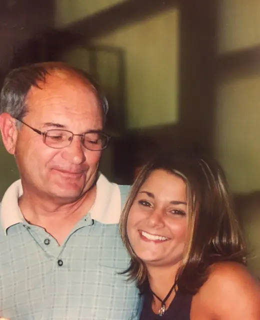 Beth smiles cheek to cheek with her dad, Rusty.