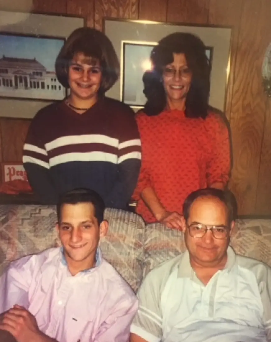 Family photo of Beth with her mom Judy, brother Josh and dad Rusty.