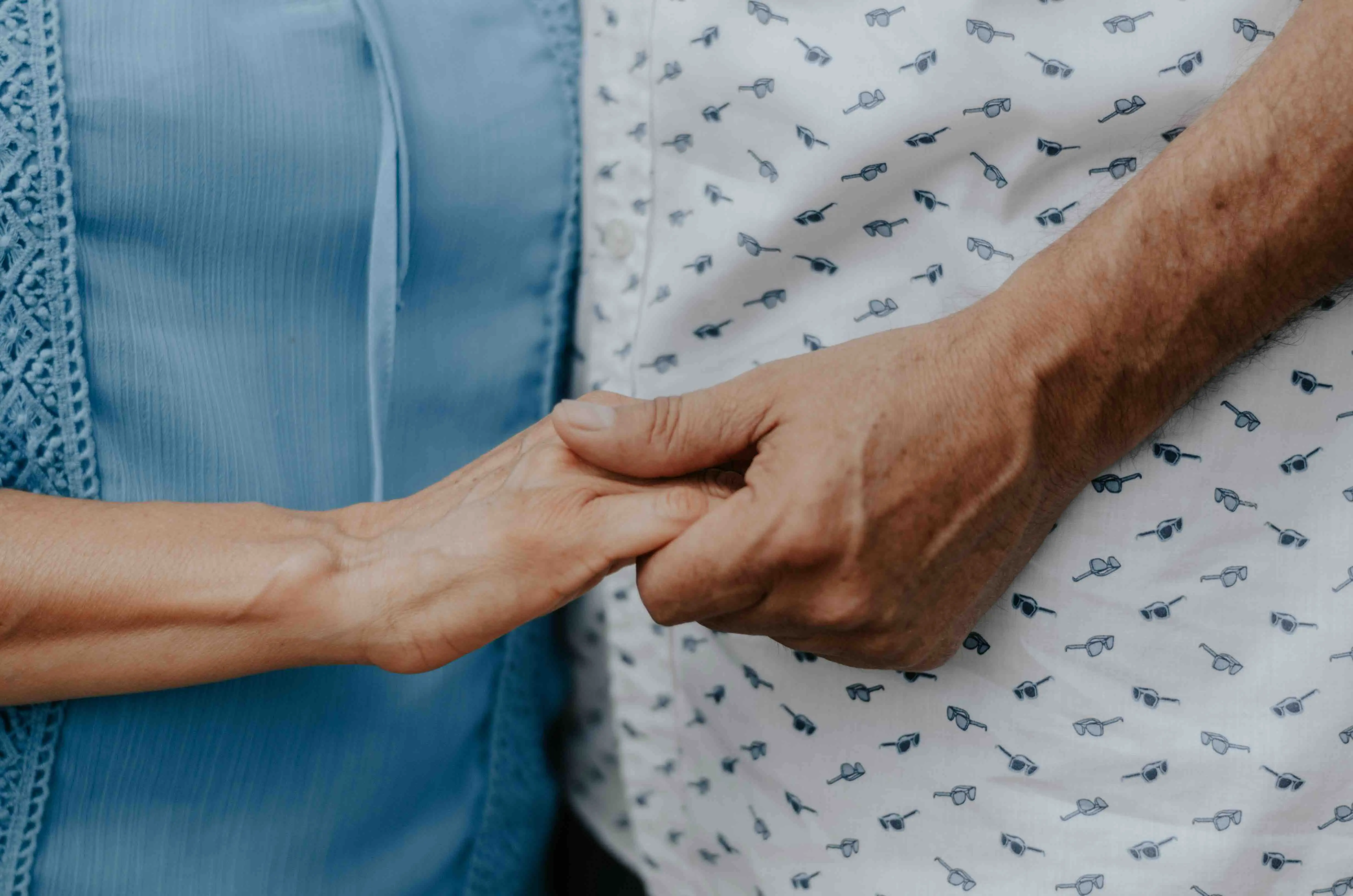 close-up of a couple's clasped hands